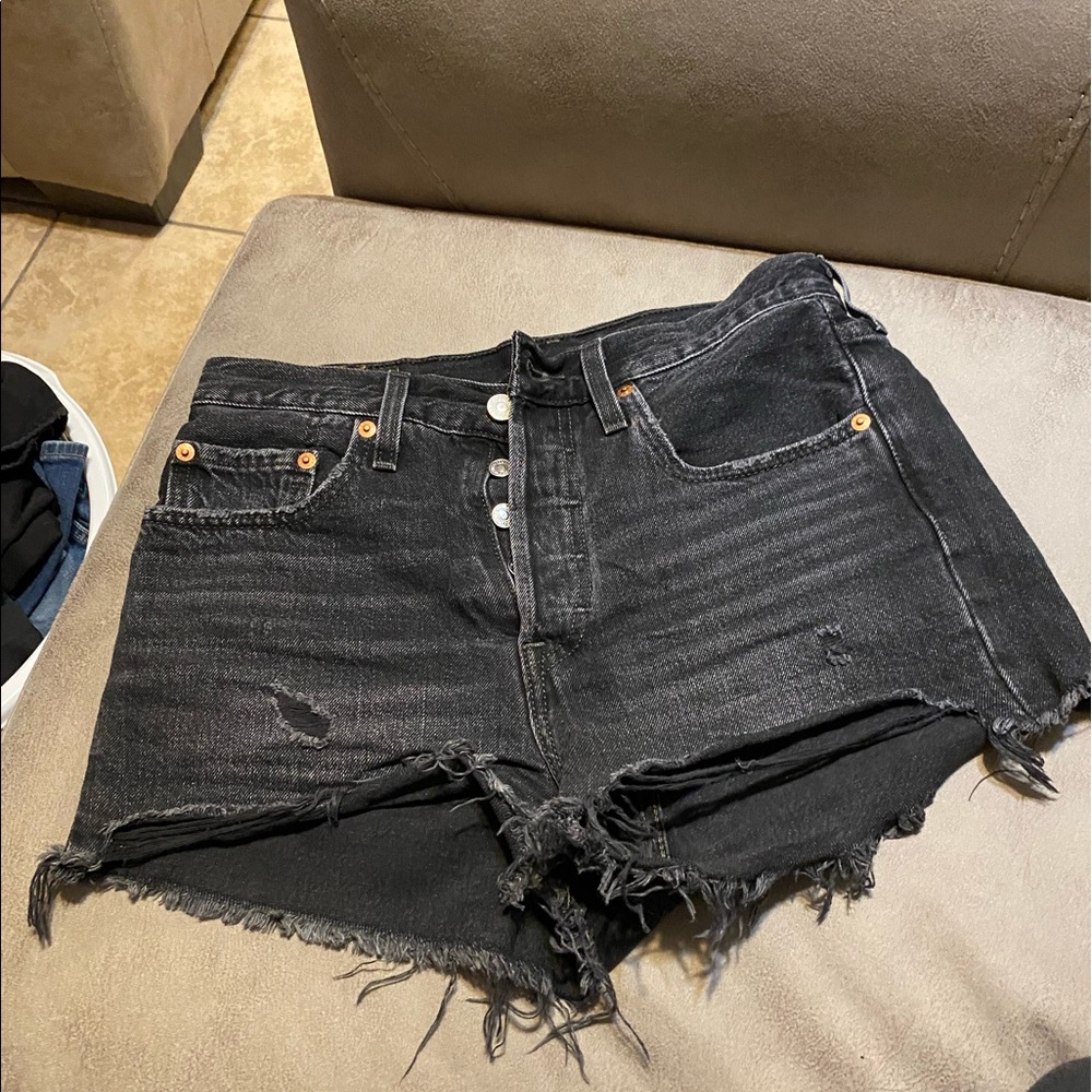 Levi’s 501 distressed black shorts